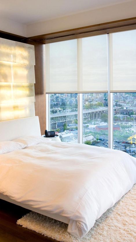 Lutron Shades in a bedroom